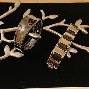 2 black metallic stainless bracelets